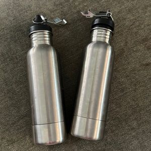 Two (2) Bottle Armour stainless steel bottle insulators